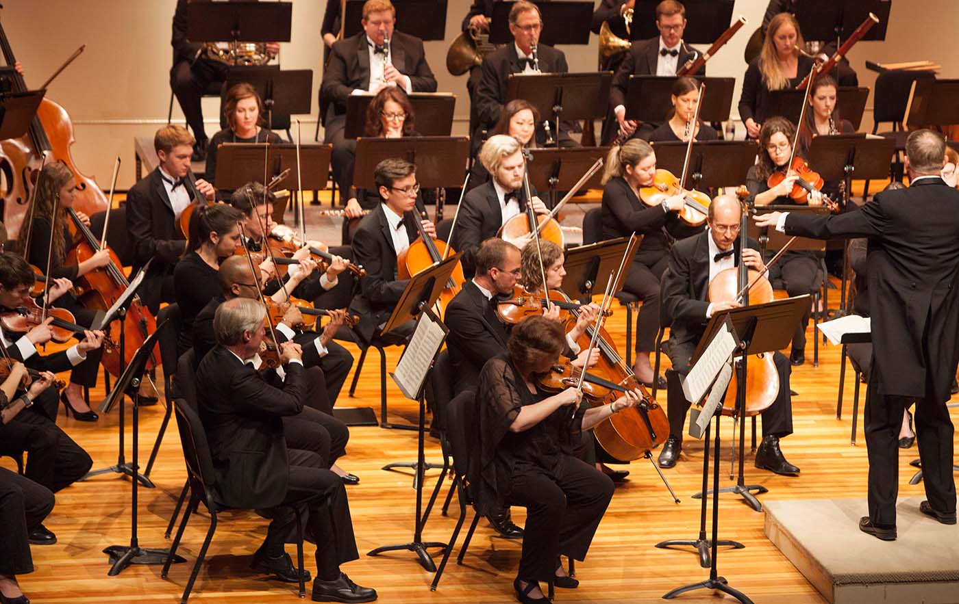 Group of musicians playing in symphony concert